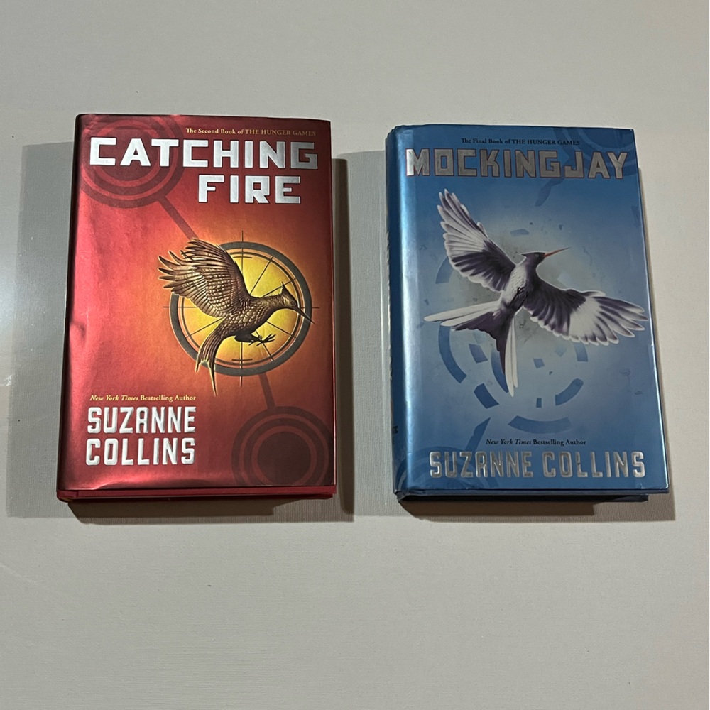 2 Hardback Hunger Games Books by Suzanne Collins- Catching Fire and Mockingjay